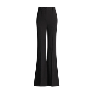 Detail view of black high-waisted flared trousers with elegant center seam stitching