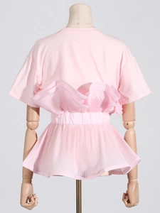 Pink slim fit T-shirt for women featuring layered ruffles and pleated peplum hem back view