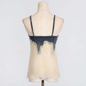 Detailed back view of denim camisole with white lace trim and adjustable thin straps