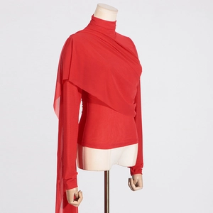 Detail view of red mesh top featuring standing collar and elegant draped ribbon pleats