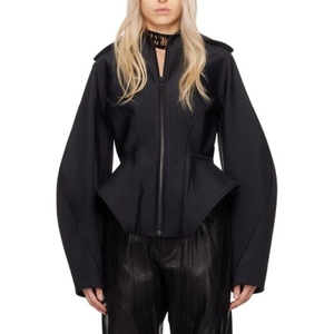 Detail of structured black jacket featuring unique peplum hem and central zipper closure