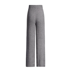 Detailed macro view of the grey ribbed knit wide-leg trousers with high waist design