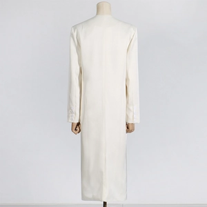 Rear view of long sleeve trench coat in cream white with four buttons on cuff