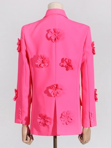 Bright pink women's blazer featuring 3D floral patchwork and a stylish loose fit cut