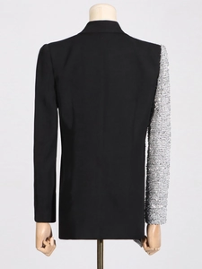 Slim fit black blazer with asymmetric silver sequin sleeve and contrast paneling
