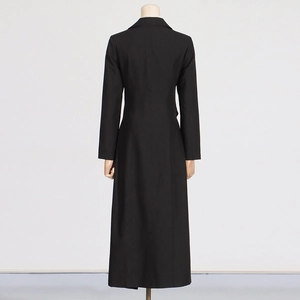 Back view of a long black trench coat featuring slim fit tailoring and smooth woven fabric