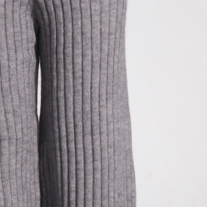 Close-up of grey ribbed knit texture and elastic cuff detail on a casual loungewear set