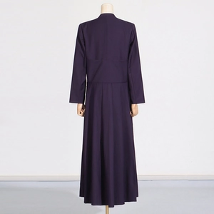 Detail view of deep purple long trench coat featuring a high-waisted pleated back design