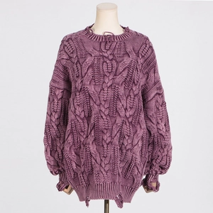 Detail view of purple chunky cable-knit sweater with vintage distressed ripped hem and cuffs