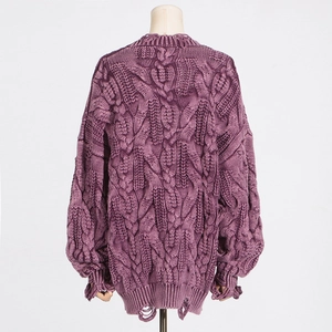 Close-up of distressed cable knit details on a purple oversized sweater for women