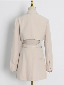 Women's apricot long sleeve blazer set with cutout back and matching mini skirt