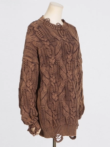 Oversized brown cable knit sweater with distressed ripped details for women in casual style