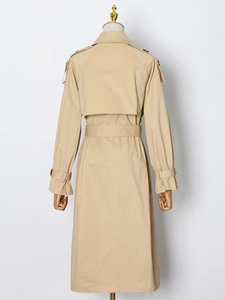 Classic khaki long trench coat with waist belt and back rain shield detail view