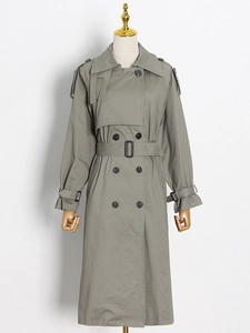 Classic olive green double-breasted trench coat with waist belt and lapel collar