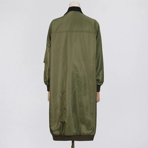 Detail view of the olive green long trench coat back with zip sleeve pocket and ribbed trim