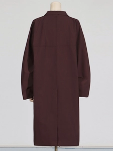 Elegant long dark wine red trench coat for women with loose fit and back vent detail