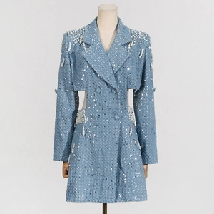 Detail view of pearl embellishments and silver sequins on light blue blazer dress