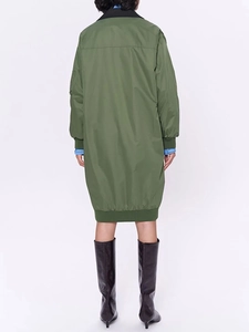 British style army green long trench coat with black collar and ribbed trim on white background