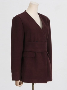 Elegant wine red wool coat with V-neckline and waist belt, professional business style