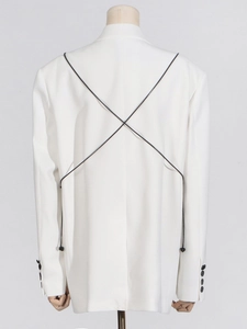 White casual blazer with black cross-tie back detail and multi-buttoned cuffs