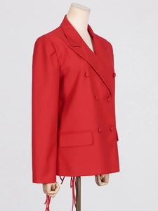 Women's trendy red double-breasted blazer with fringe detail and peaked lapels