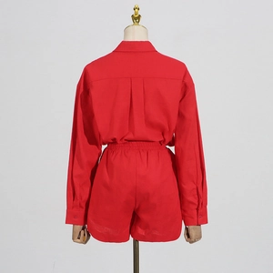 Rear view of red long-sleeve lapel shirt with pleated back and high-waist shorts set