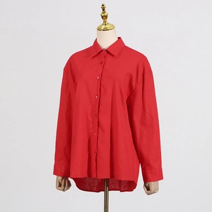 Detail of red lapel shirt with cotton linen texture and matching buttons
