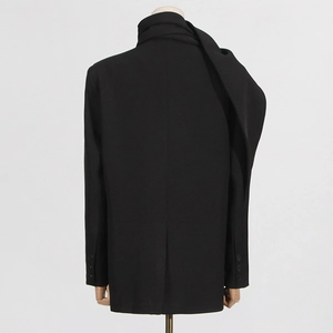 Back view of black blazer with a scarf collar design and a single vent on the hemline