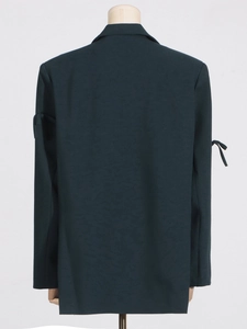 Blazer bleu sarcelle pour femme avec détails nœuds aux poignets et coupe droite élégante