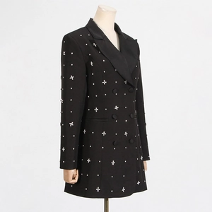 Detail of black fitted blazer featuring sparkling rhinestone flower patterns and lapel
