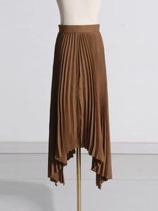 Dark brown high-waisted pleated midi skirt with irregular hemline and front-short back-long cut