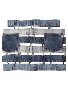 Deconstructed denim mini skirt with patchwork waistbands and navy pockets