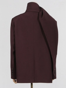Back view of a premium burgundy casual blazer for women with refined button cuff details