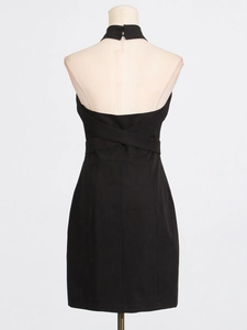 Elegant black halter mini dress with backless cross pleat detail on a mannequin