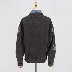Vue arrière de la veste en jean anthracite avec strass et col bleu en patchwork