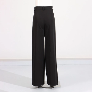 Detail view of black high-waisted wide-leg trousers with smooth draping fabric from the back