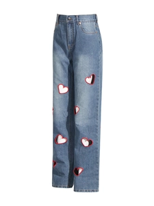 High waist straight leg blue jeans with hollow heart cut-outs and heart patchwork design