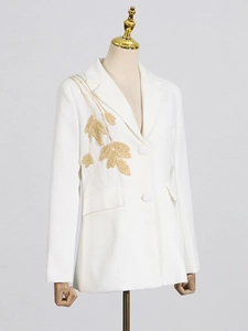 Elegant white blazer for women featuring exquisite gold leaf embroidery and classic lapels