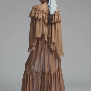 Detailed back view of brown off-shoulder chiffon dress with elegant tiered ruffles
