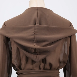 Detail view of dark brown chiffon hooded jacket with waist tie and back pleats