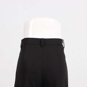 Detailed view of rear waistband and stitching on black high-waisted wide-leg suit trousers