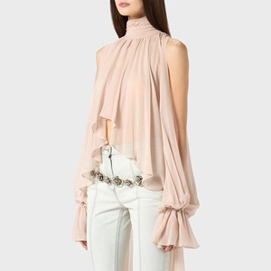Detail of nude pink chiffon sleeveless top with high collar and asymmetric ruffles