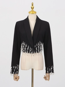 Women's black cropped blazer featuring crystal fringe trim and shawl collar for spring 2026