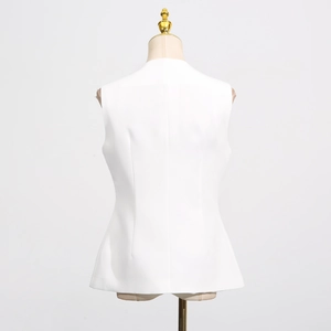 Rear view of white slim fit sleeveless vest showing structured seams and tailored waistline