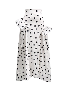 Jupe midi blanche à pois noirs élégante avec taille haute et volants asymétriques