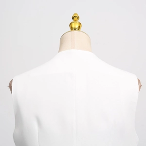 Detailed back view of white sleeveless vest with structured fit and center seam
