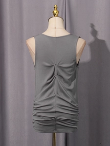 Grey sleeveless vintage tank top with back pleat design displayed on a white mannequin