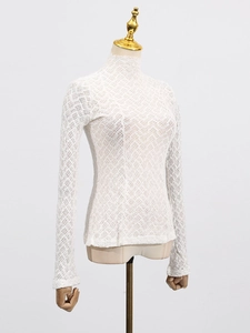 Slim fit white lace turtleneck top with intricate hollow knit texture for women