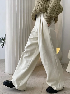 Minimalist high-waisted off-white wide-leg trousers for women with elegant drape and side pleats