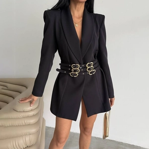Detailed view of black slim blazer dress featuring triple waist belts and gold ring buckles